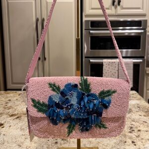 Handcrafted in India Pink Beaded bag with blue Floral design